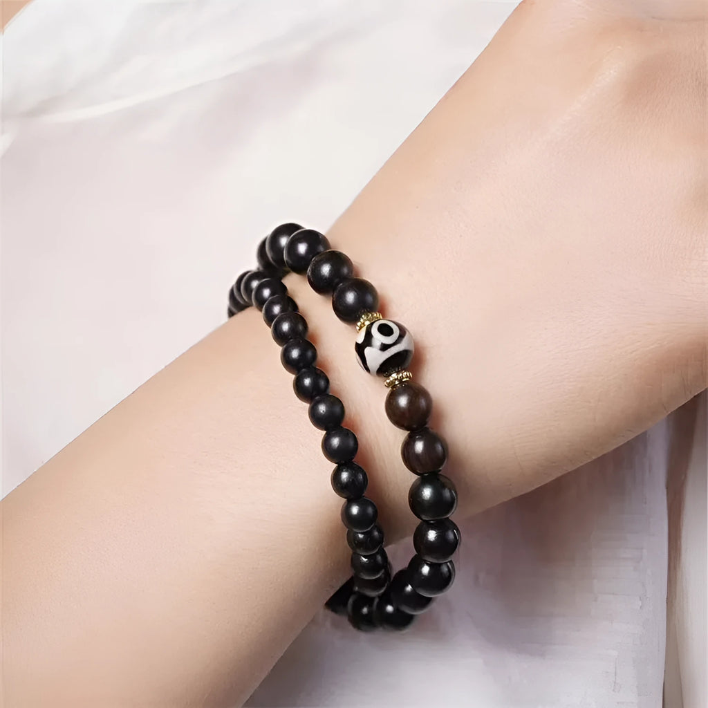 Ebony wood bracelet with 8mm diameter and two circles of beads in retro style