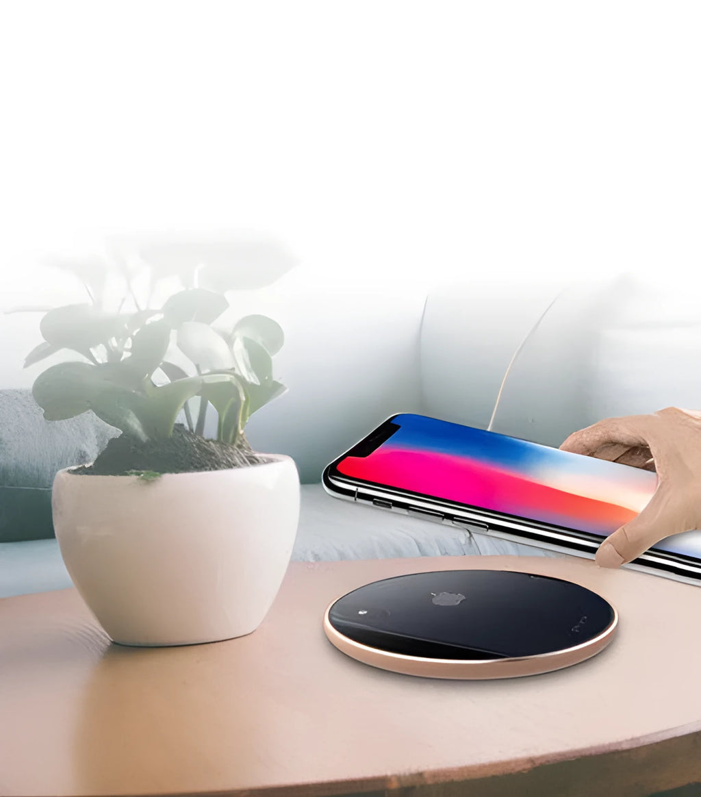Ultra-thin aluminum wireless charger in silver colour showing charging indicator light