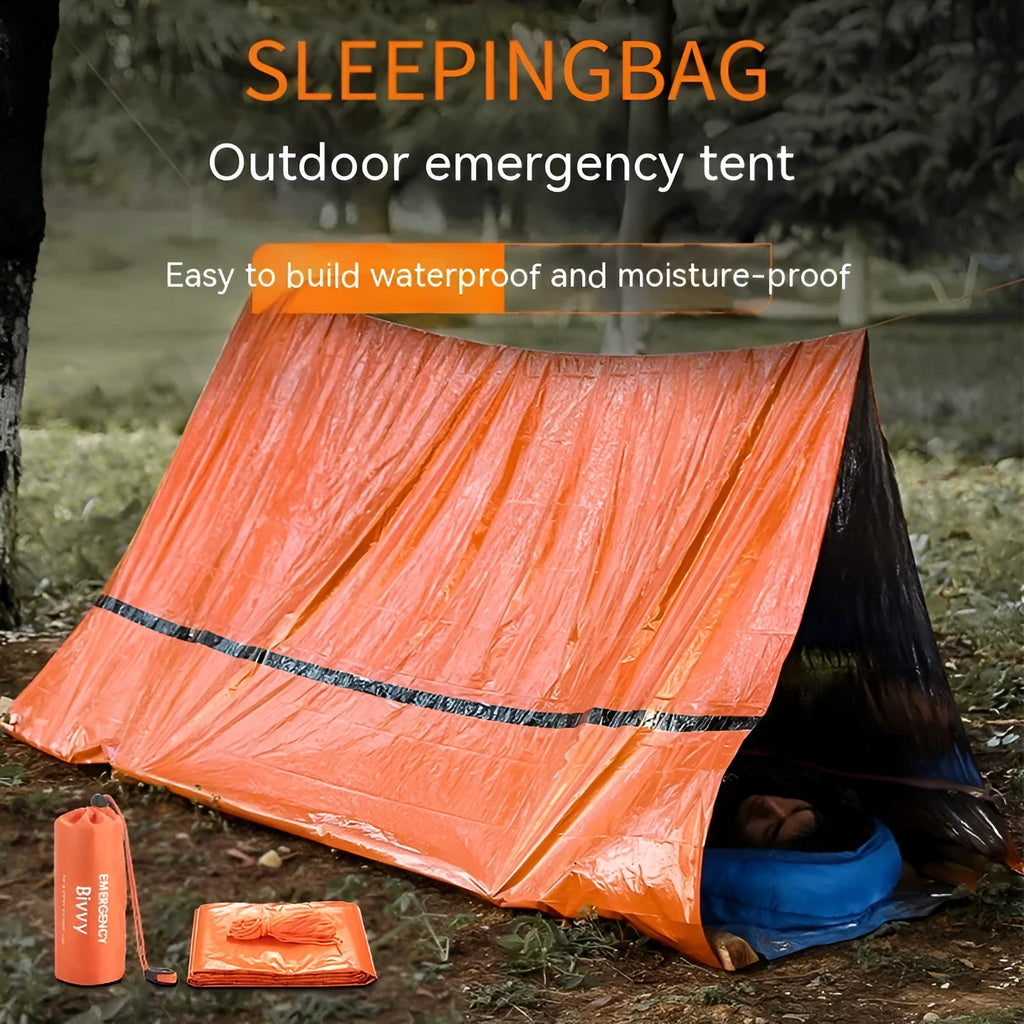 Portable orange disaster relief tent with sleeping bag and emergency blanket for outdoor use