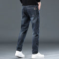 Slim straight casual trousers in polyester fabric with mid waist and zipper fly
