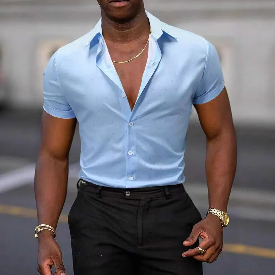 Men's light blue floral print short-sleeved shirt made from stretch polyester fabric.