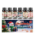 Christmas essential oil set with six 10ml bottles featuring festive scents like gingerbread and Christmas pudding.