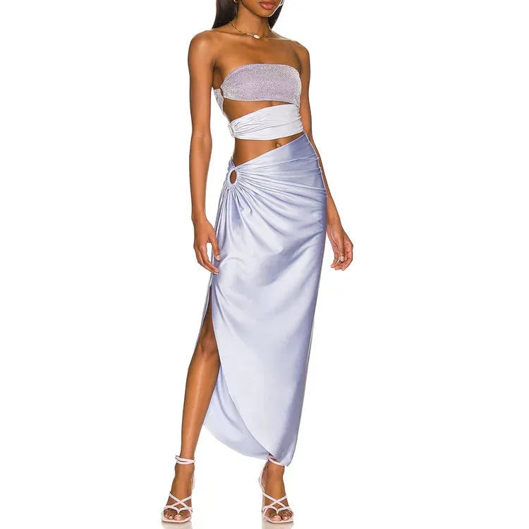 Purple one-piece swimsuit with matching wrap skirt on a mannequin, showing the tight fit and European/American styling.
