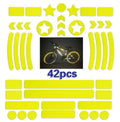 Sheet of bicycle reflective safety tape with a geometric grid pattern in one of four colour options.
