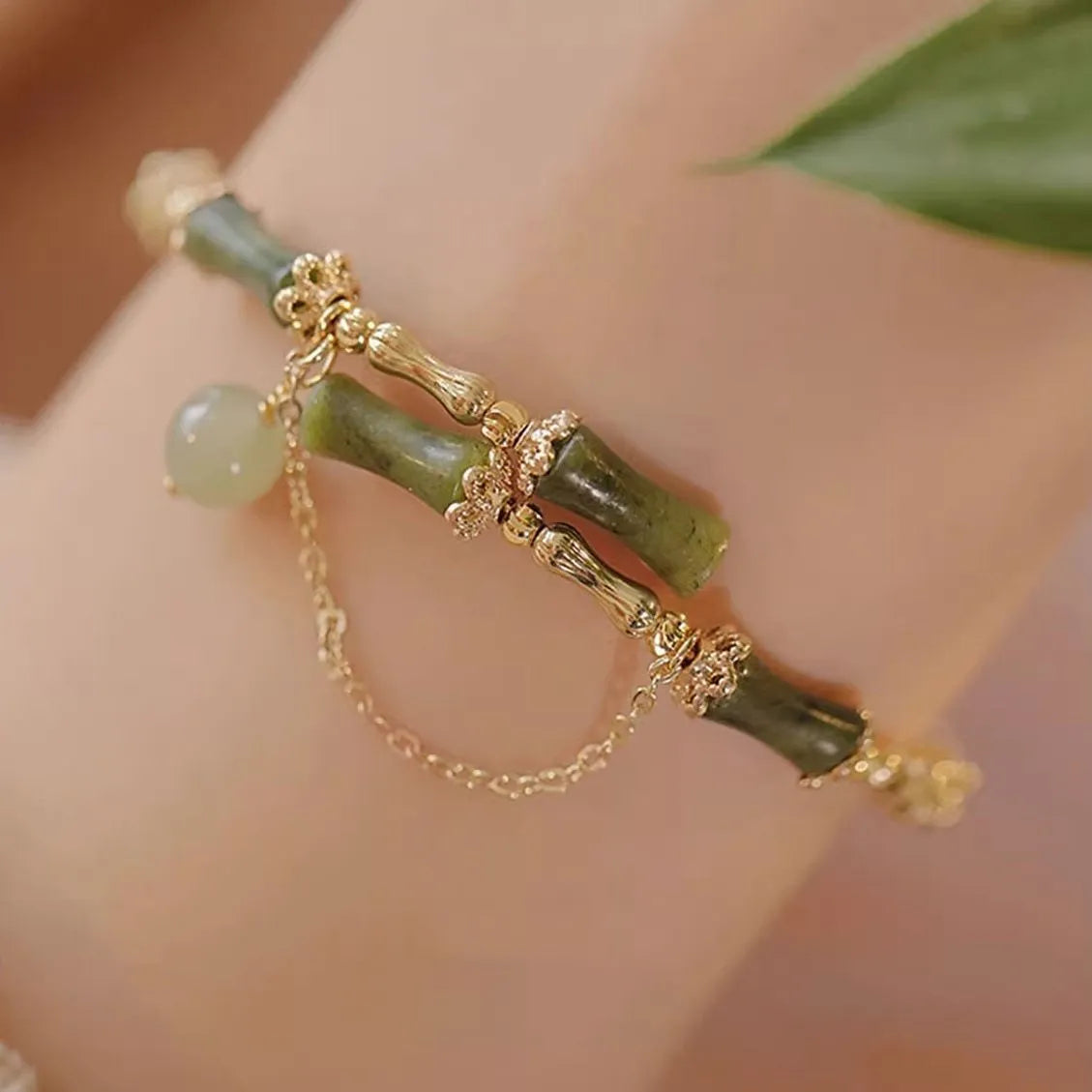 Women's plum wine coloured bamboo beaded bracelet with coloured glaze construction