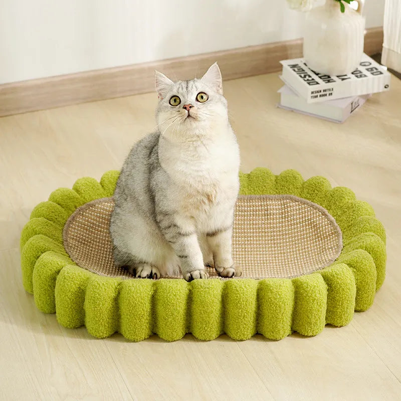 Green oval sisal cat scratcher pad bed measuring 650mm by 420mm