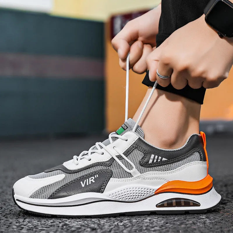 Men's gray and black breathable mesh casual running shoes with a round toe and EVA sole.