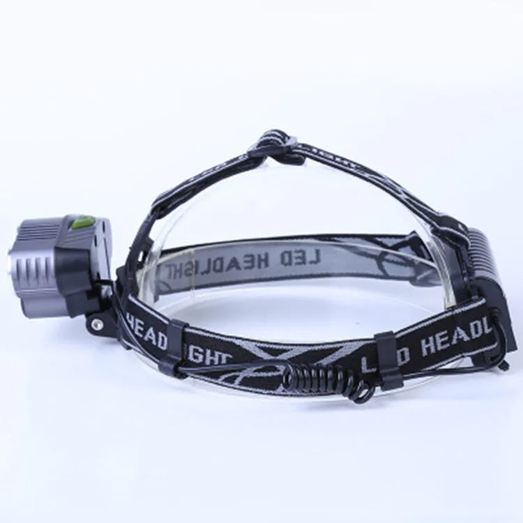 Fixed focus LED head torch for outdoor camping with long-range illumination.