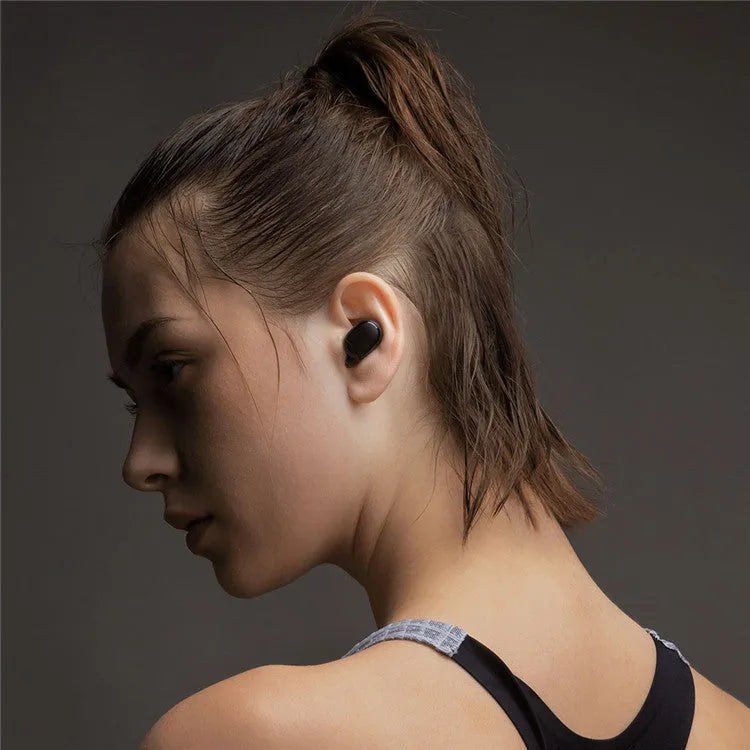 Redmi AirDots 2 Black true wireless Bluetooth earbuds and charging case on a white background.