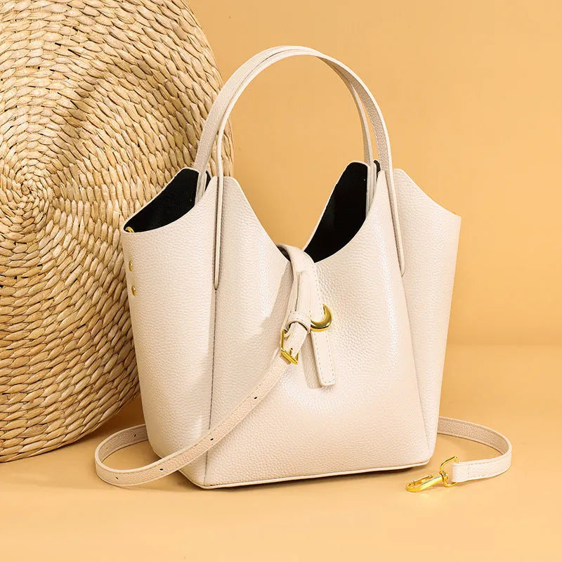 Genuine leather women's bucket handbag in retro style with large capacity and internal file organisation