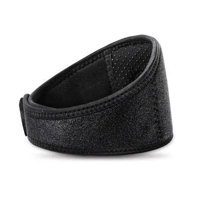 Black self-heating magnetic neck guard with adjustable shoulder strap laid flat.
