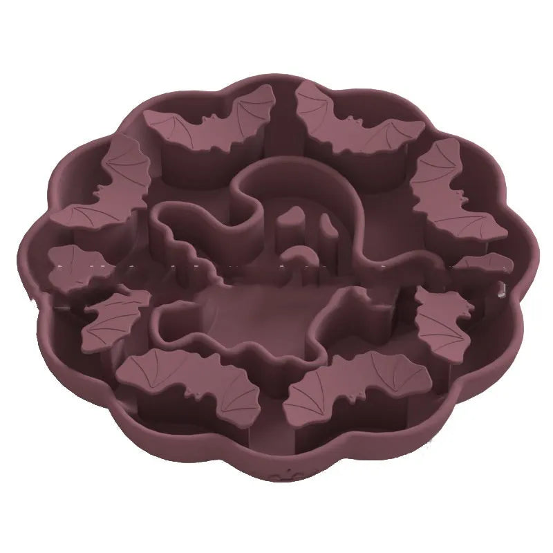 Edible silicon anti-choke slow feeding dog bowl in Halloween orange colour on floor