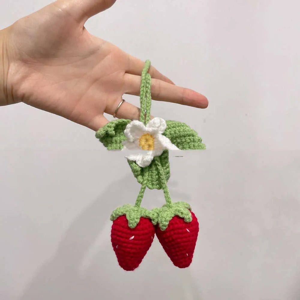 Handmade strawberry-shaped car decoration pendant woven from cotton and hemp materials using hook knitting techniques