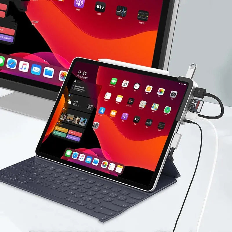 Silver aluminium Type-C docking station for iPad Pro with multiple ports including HDMI and USB