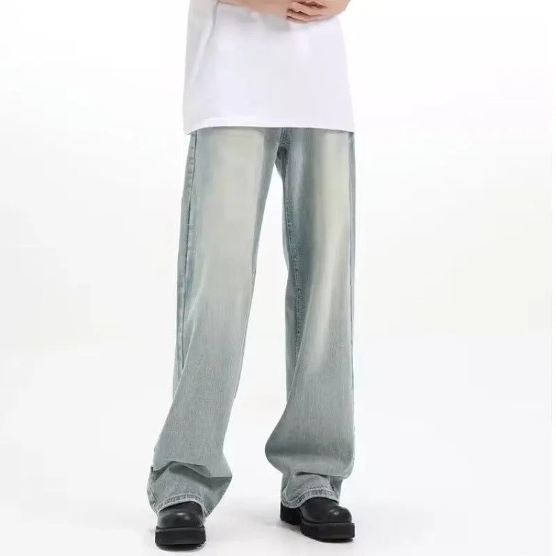 Blue loose-fit rabbit fur retro jeans with an elastic waistband on a neutral background.