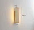 Solid wood Nordic Japanese style LED wall lamp mounted on bedroom wall with warm light, available in 22cm 32cm 52cm sizes
