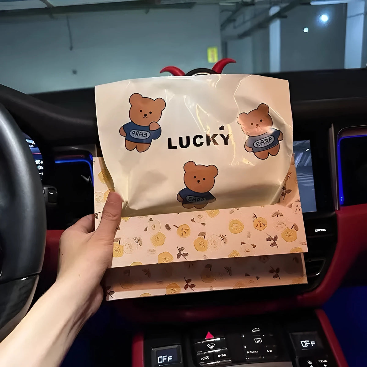 PE car trash adhesive clean bag with flat top design, available in Lucky Bear and Rabbit styles, 20 or 40 pieces.