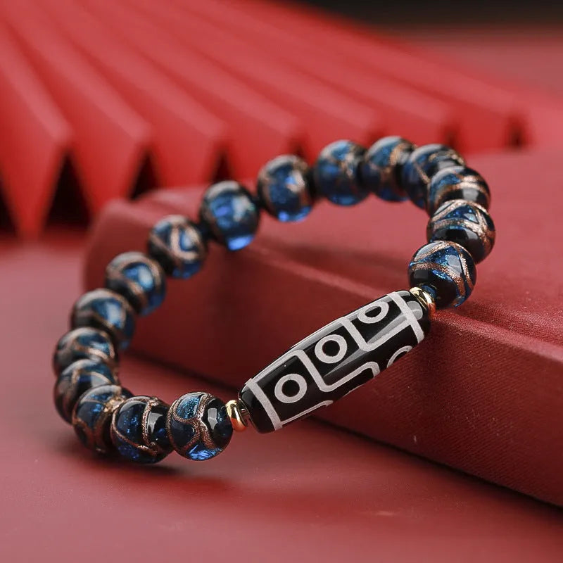 Traditional Chinese coloured glaze bracelet with year snake and lucky bead elements in ancient five-colour design