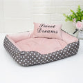 Polka dot printed dog bed with matching square pillow in grey colour