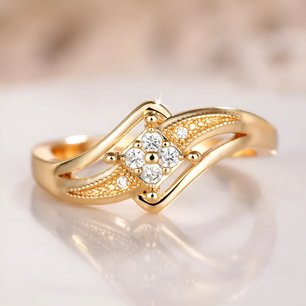 Yellow gold copper diamond ring with geometric design and inlaid zircon detailing