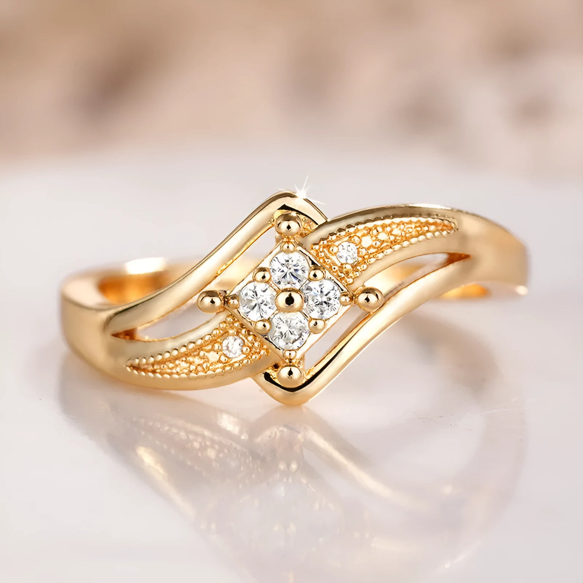 Yellow gold copper diamond ring with geometric design and inlaid zircon detailing