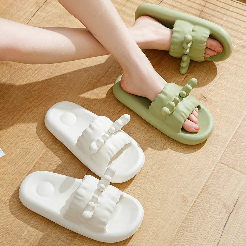 Deer horn design EVA flip-flop slippers in light yellow on a non-slip sole.