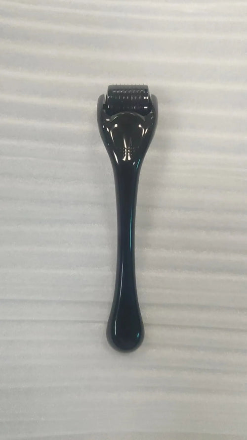 540 Micro Needle Roller device with mechanical font size display showing needle specification