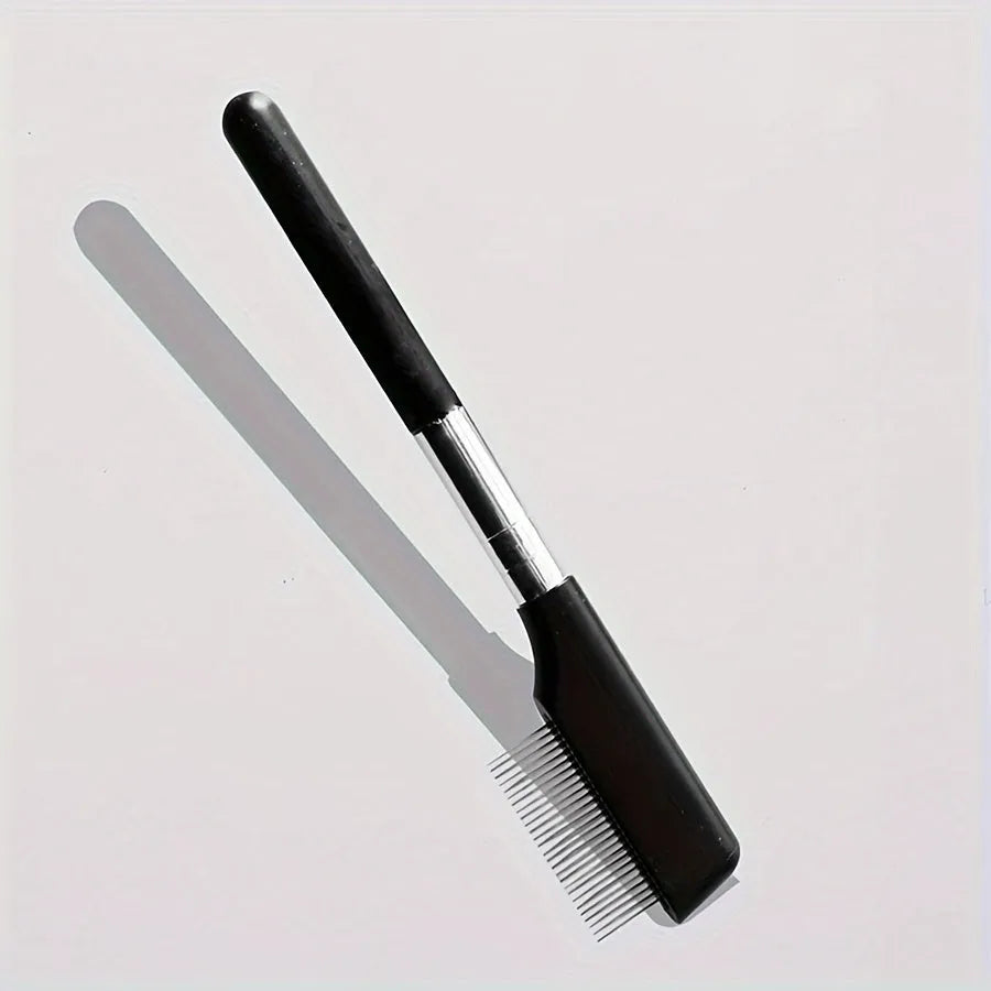 Black pet grooming brush with soft silicone bristles and comb section for dogs and cats