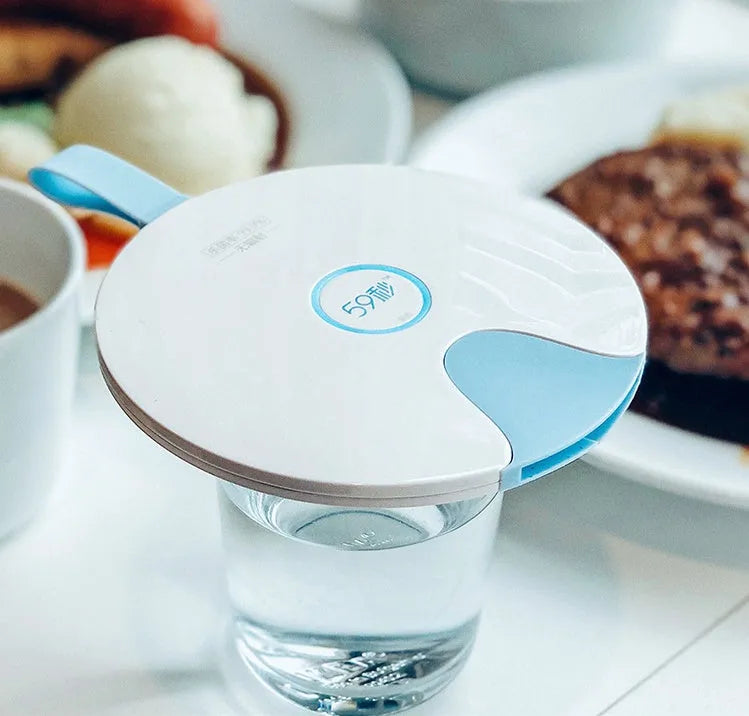Blue portable UV baby bottle steriliser showing compact rectangular design with USB port