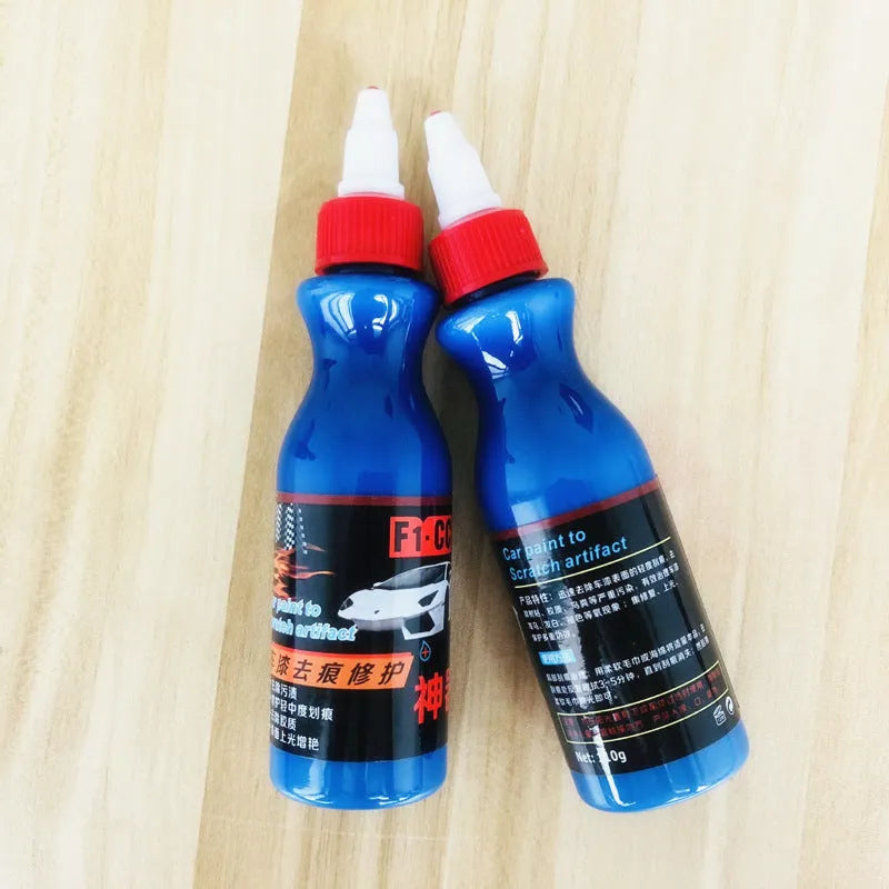 Automobile scratch repair kit with blue wiping tool and repair agent bottle for car paint restoration