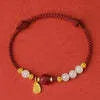 Women's adjustable bracelet with Hetian jade, cinnabar red rope and 925 silver components