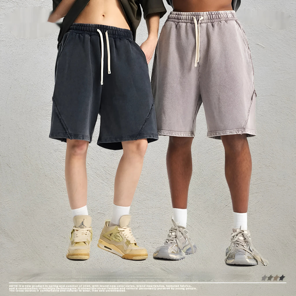 Men's loose-fit batik washed shorts in cotton terry fabric, showing patch craft details and available colour options.