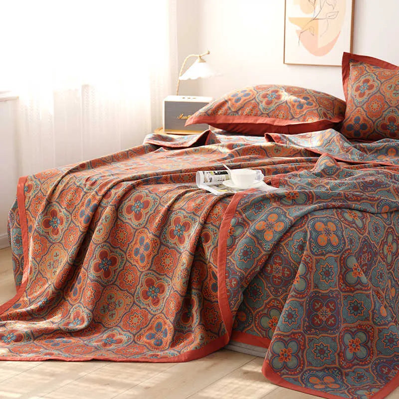 Cotton gauze bed blanket three-piece set with floral patterns showing blanket and two pillowcases