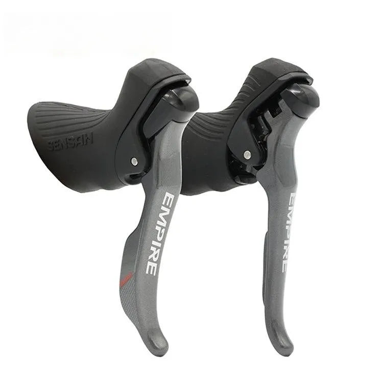 Road bike transmission kit with aluminium manual shift lever, front dial, and short leg rear derailleur.