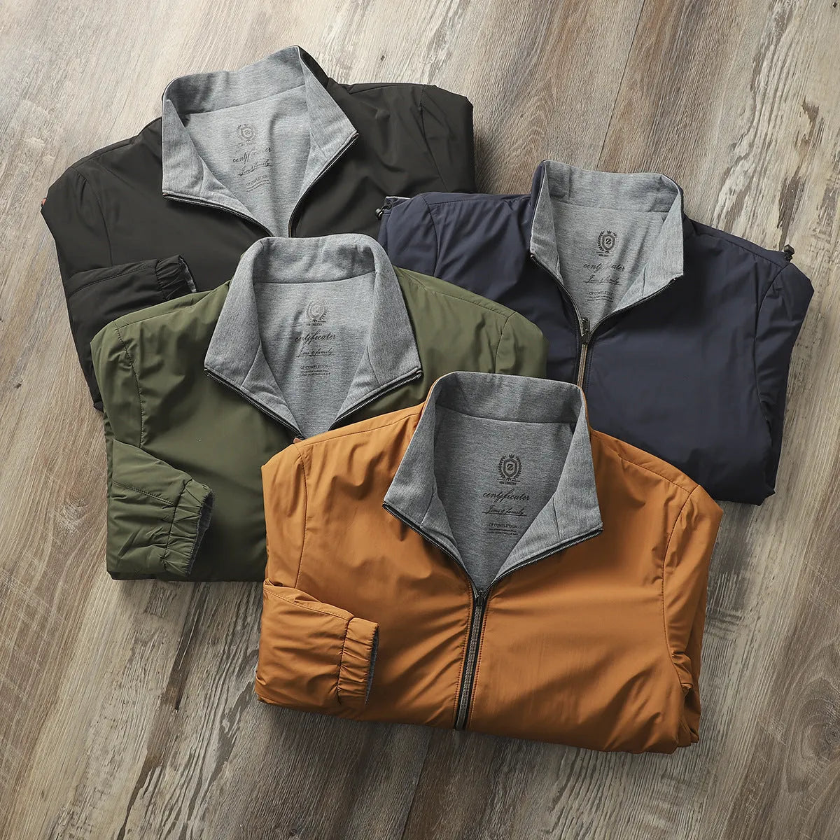 Men's plain stand collar jacket in a polyester cotton blend fabric, shown in blue.