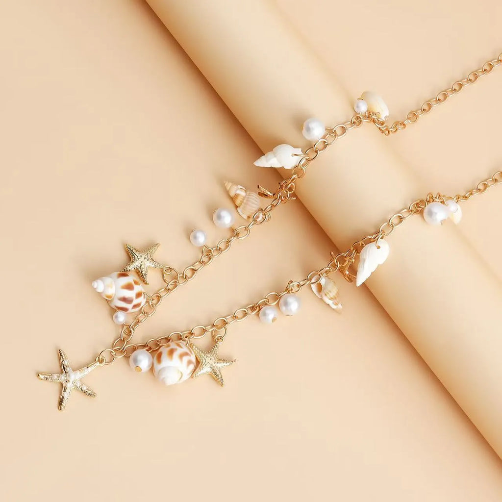 Women's alloy metal waist chain and matching bracelet jewellery set with star shape design
