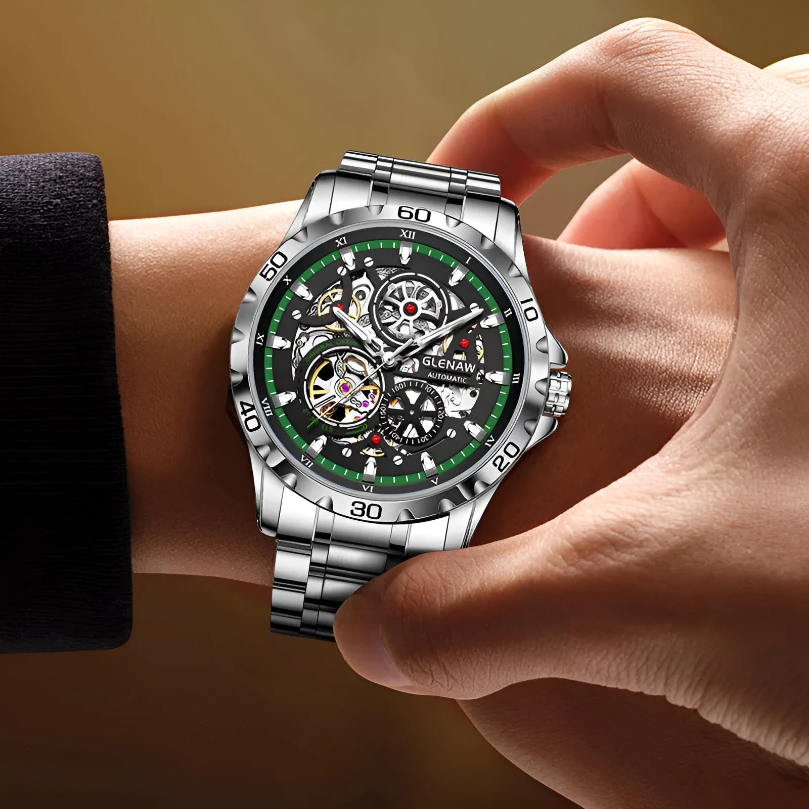 Silver men's automatic watch with hollow-out dial showing mechanics, luminous markers, and a blue stainless steel strap.