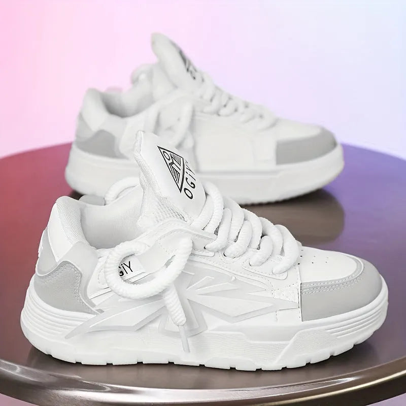 Men's white chunky sneakers with cartoon pattern, thick rubber sole, and lace-up front.