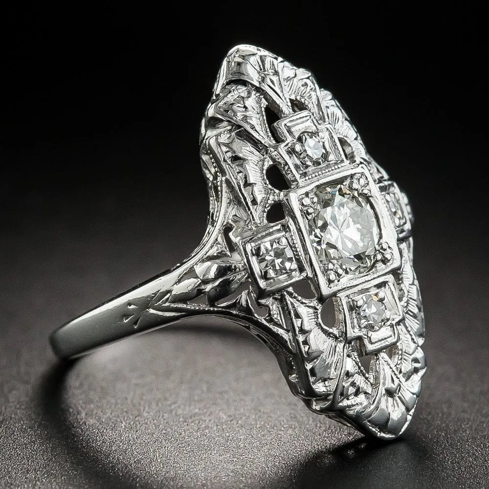 Geometric hollow out silver ring with diamond stud accents on copper base