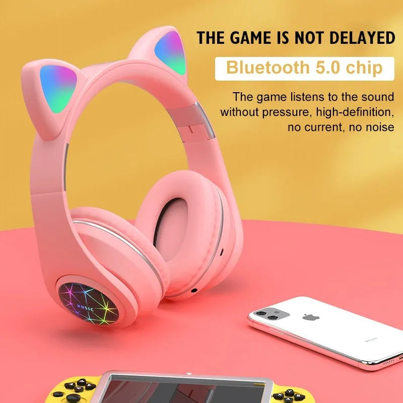 Wireless cat ear Bluetooth headset in multiple colours, showing head-mounted design for sports and music.