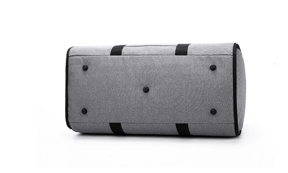 Cylinder-shaped medium travel bag in oxford cloth, shown in black, with a zipper closure.