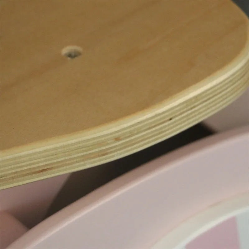 Pink wooden balance scooter for toddlers aged 1 to 6 years, 10 inches long.