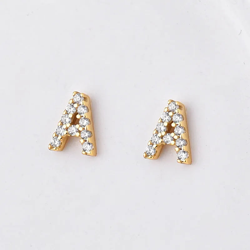 Brass gold plated alphabet letter earrings with zircon detailing showing single letter personalisation