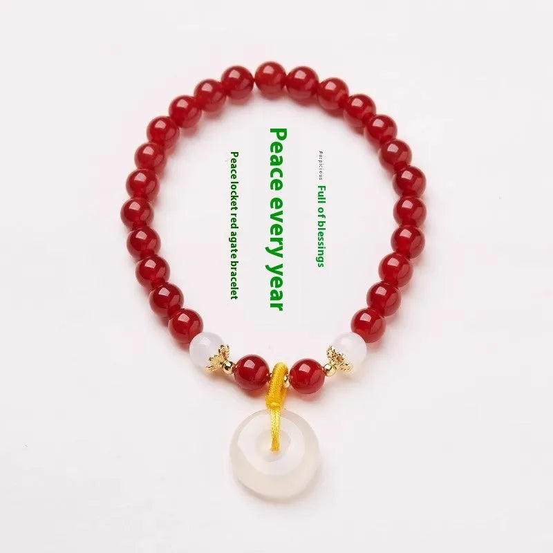 Handmade Chinese style bracelet with natural jinsi jade beads and traditional safety clasp