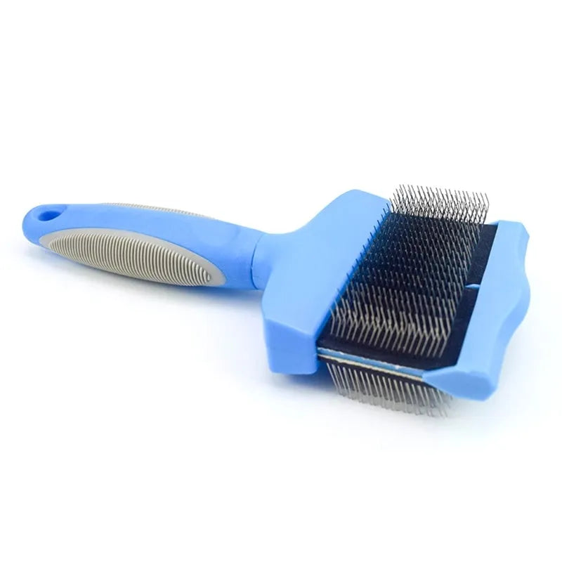 Blue and pink double-sided pet brushes showing soft bristles and stainless steel pins on a non-slip handle.