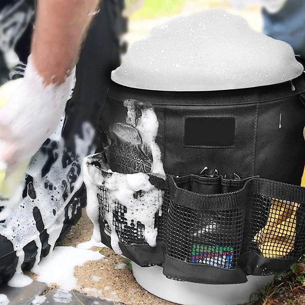 Black cylindrical polyester storage bag fitted onto a 5-gallon bucket for holding car wash tools and fishing gear.