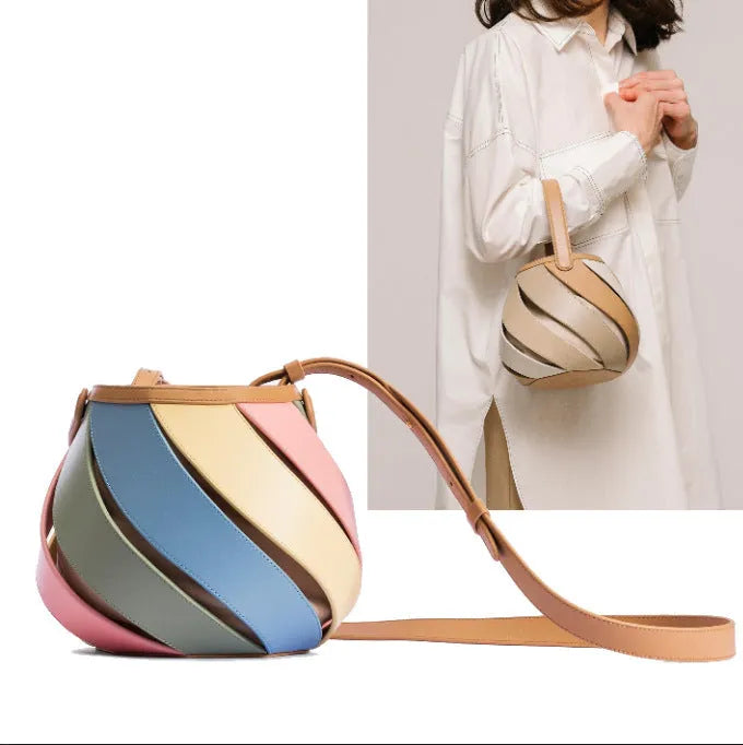 Cylindrical diamond quilted bucket bag in beige with contrast stitching