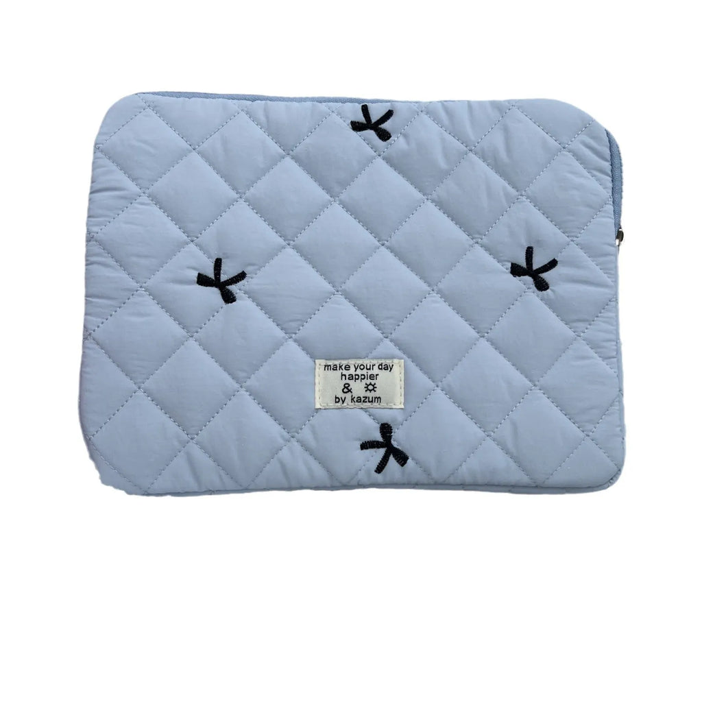 Cute rhombus embroidered bow laptop storage bag in nylon, shown in light pink colour.