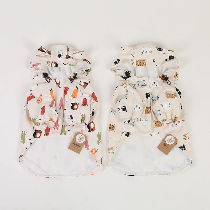 Beige dog raincoat with a cartoon animal print, showing sizing options for waterproof pet wear.