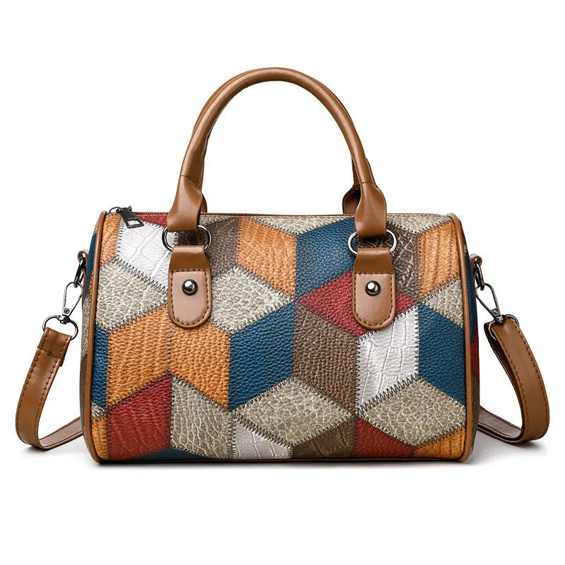 Cylinder crossbody shoulder bag in black or brown PU with plaid geometric pattern and single strap